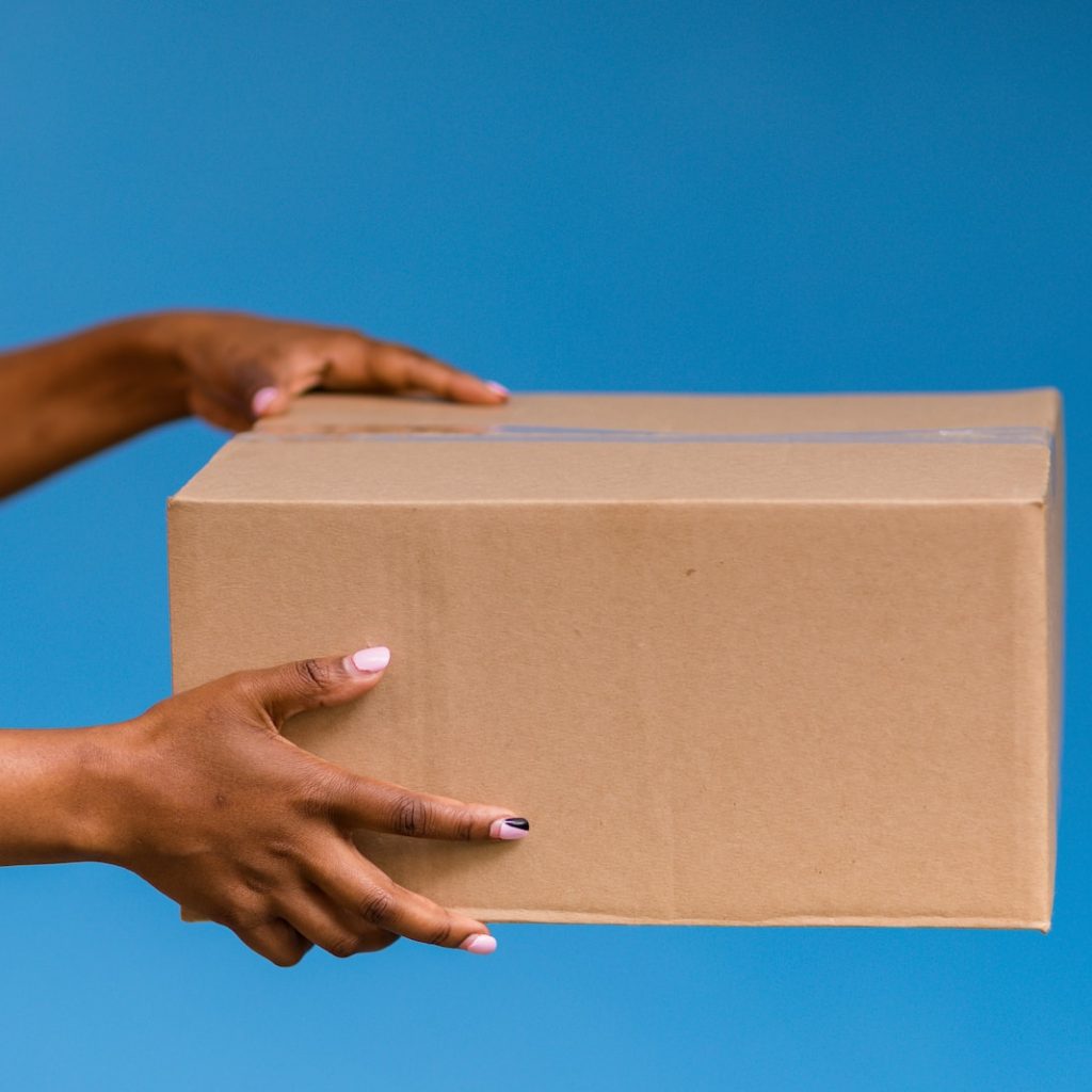 hands holding a box
